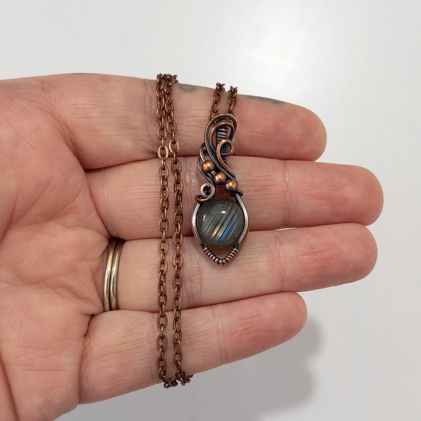 Diagonalis- Labradorite Wrapped Copper Pendant