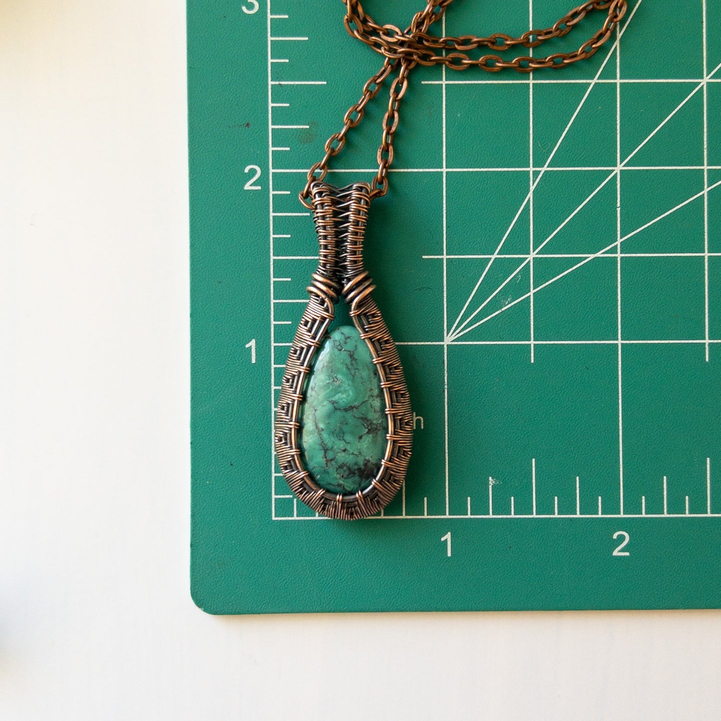 Turquoise Woven Copper Pendant