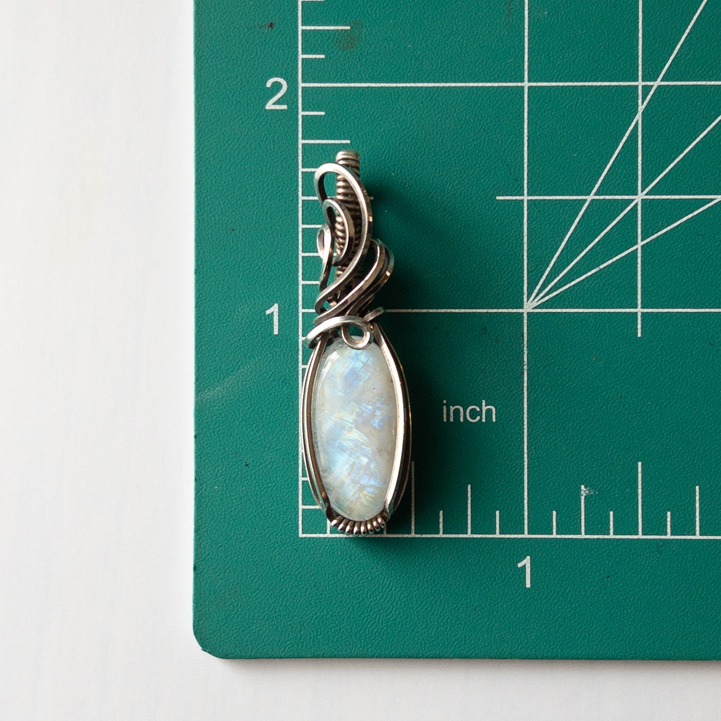 Rainbow Moonstone Sterling Silver Wrapped Pendant