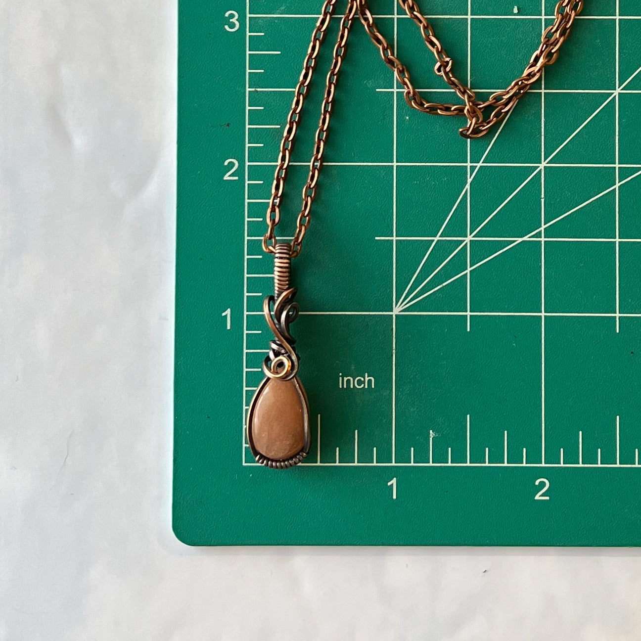Dainty Sunstone & Antiqued Copper Wrapped Pendant
