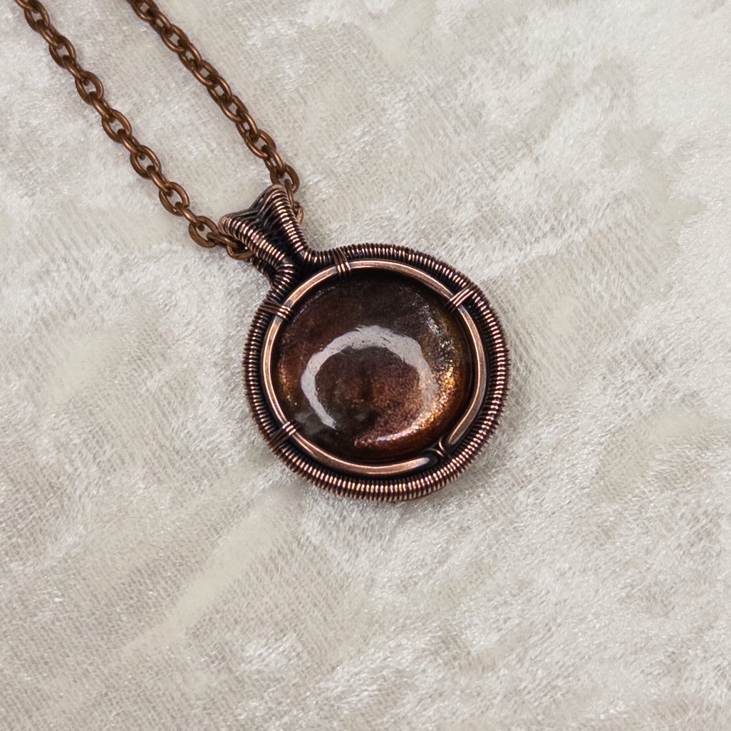 Purple Haze Sunstone Antiqued Copper Medallion Pendant