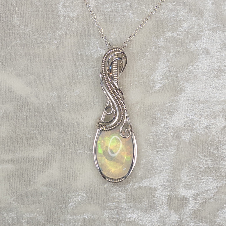 11.75ct. Ethiopian Opal .925 Sterling Silver Pendant