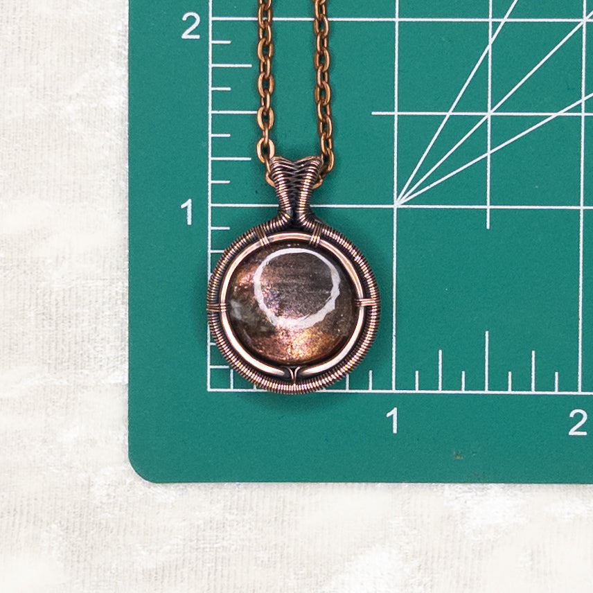 Purple Haze Sunstone Antiqued Copper Medallion Pendant