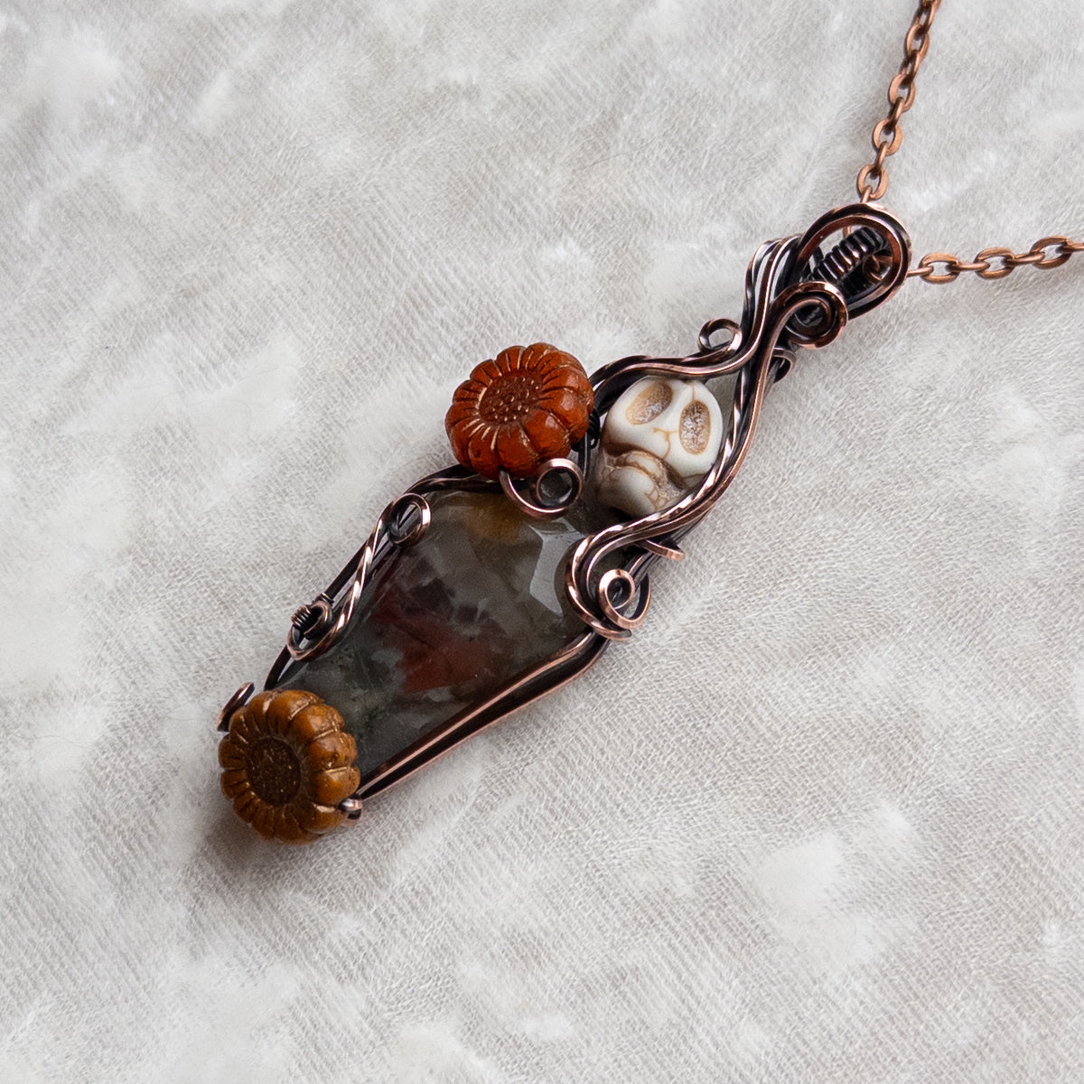 African Bloodstone Coffin, Skull, & Sunflower Antiqued Copper Pendant