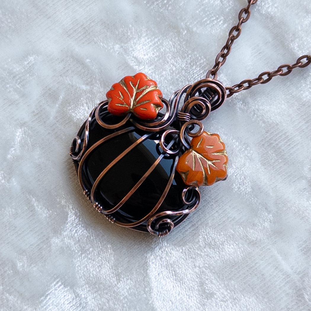 Black Onyx Pumpkin Pendant With Orange Czech Glass Leaves - Antiqued Copper