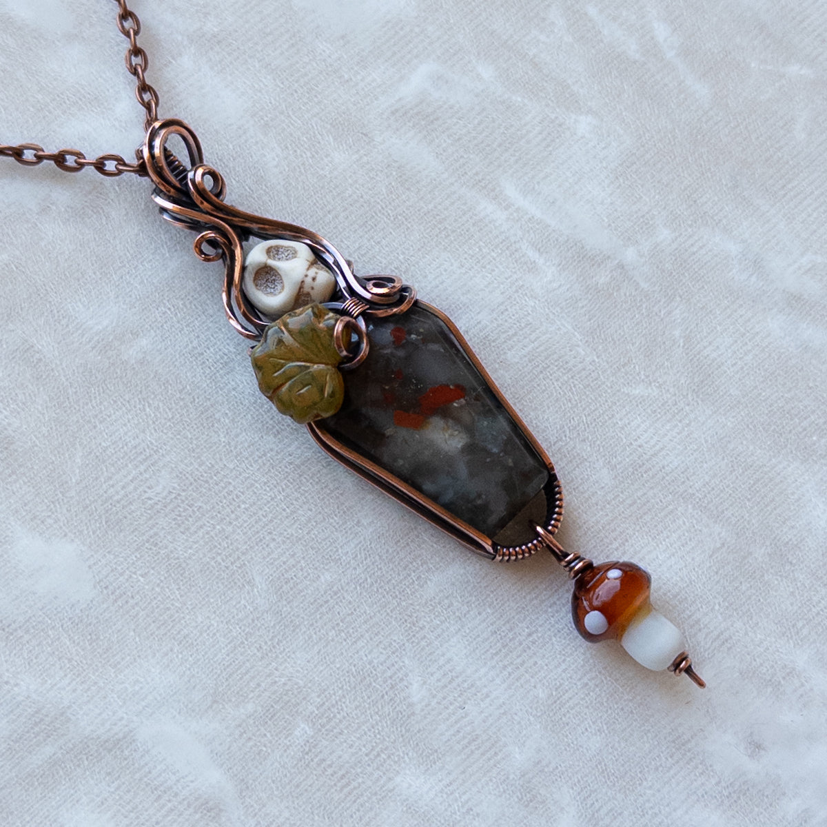 African Bloodstone Coffin Antiqued Copper Pendant With Skull, Leaf, & Dangling Glass Mushroom