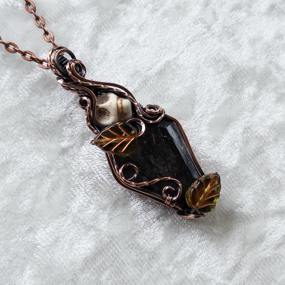 Tourmalinated Quartz Coffin & Skull Antiqued Copper Pendant With Czech Glass Leaves