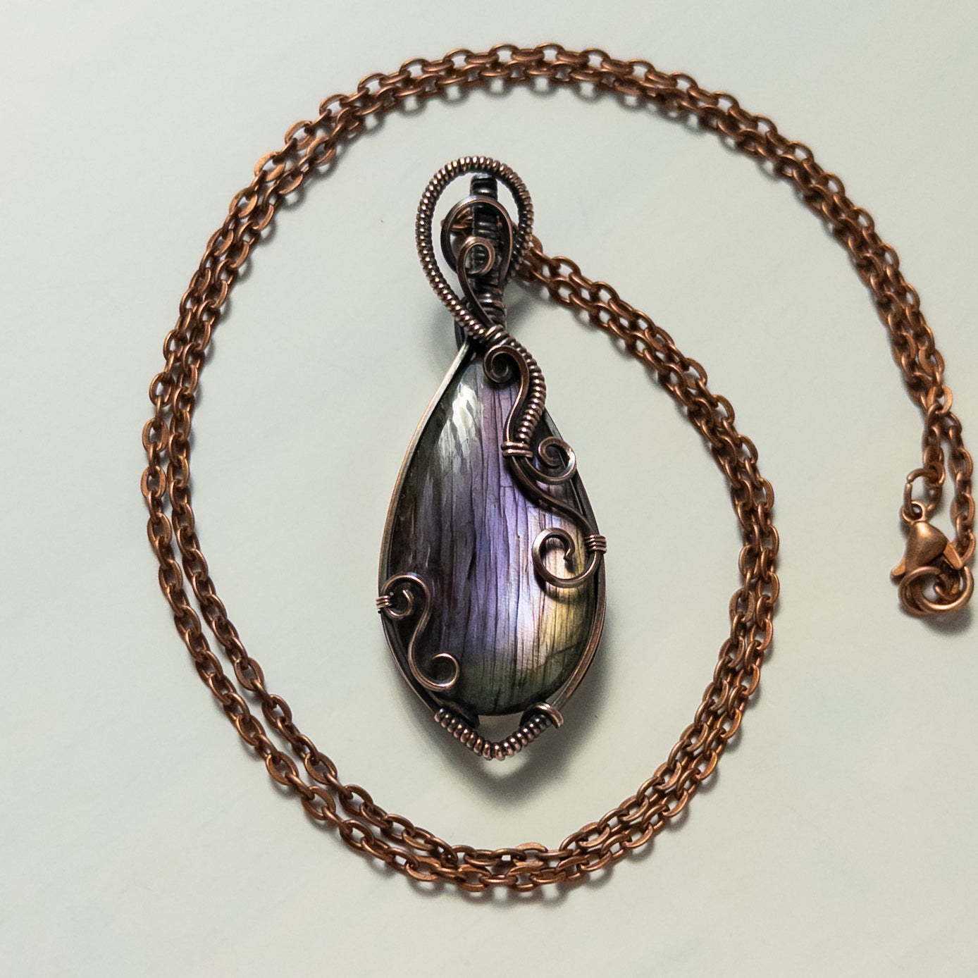 Purple Labradorite with Swirl Design Antiqued Copper Wrapped Pendant