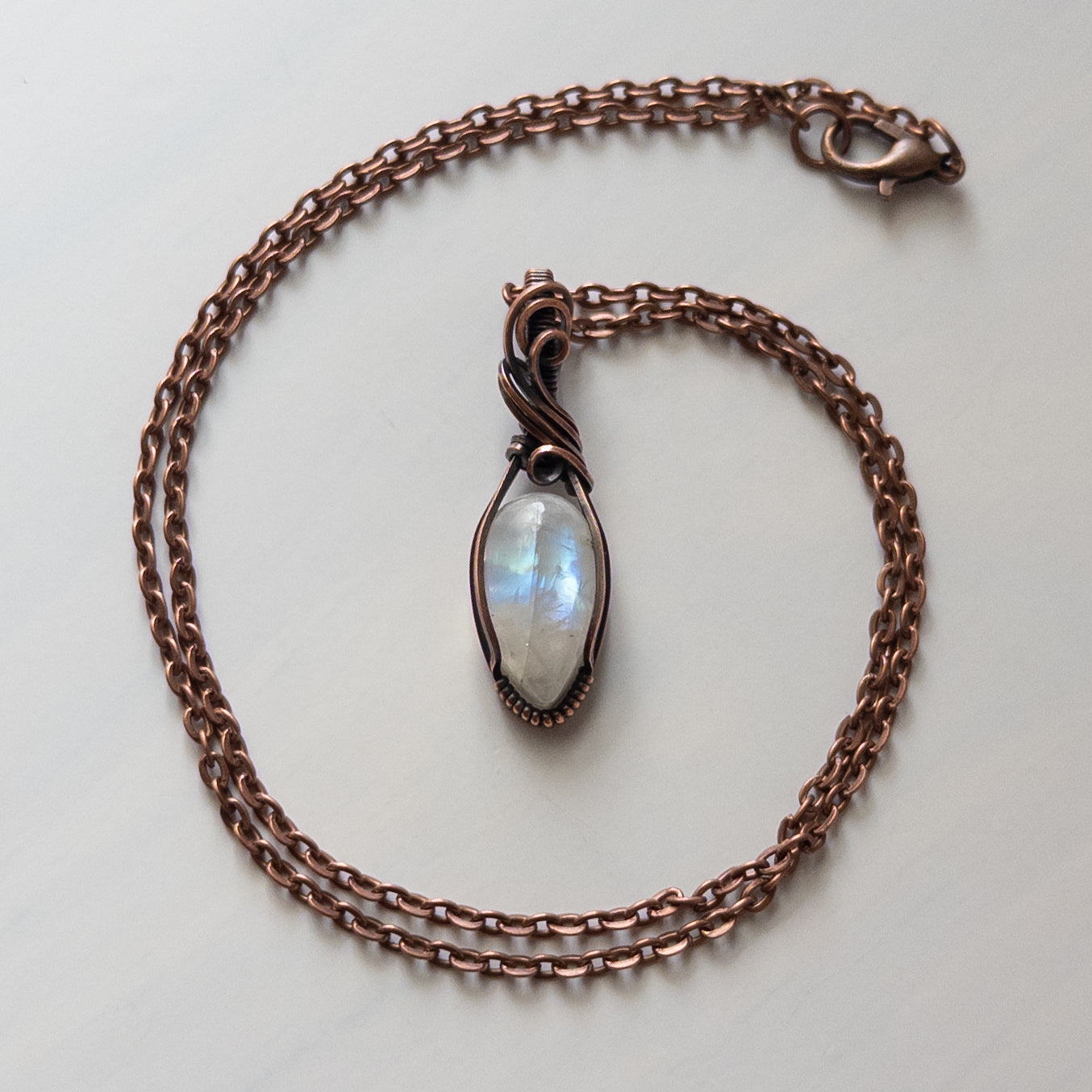 Dainty Moonstone Copper Wrapped Pendant