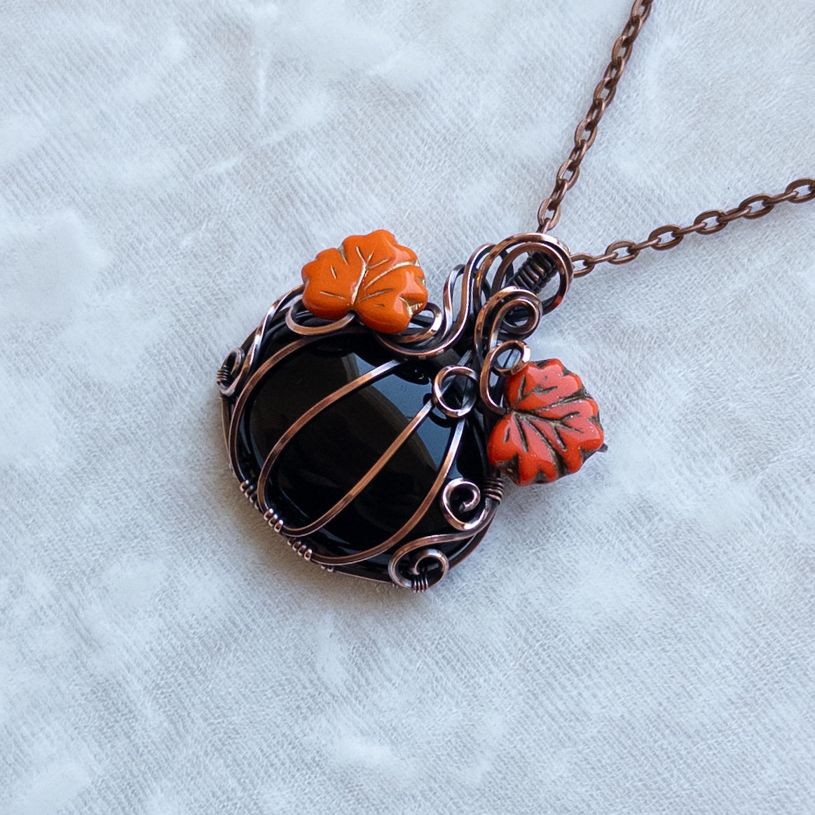 Black Onyx Antiqued Copper Pumpkin Pendant With Orange Leaves