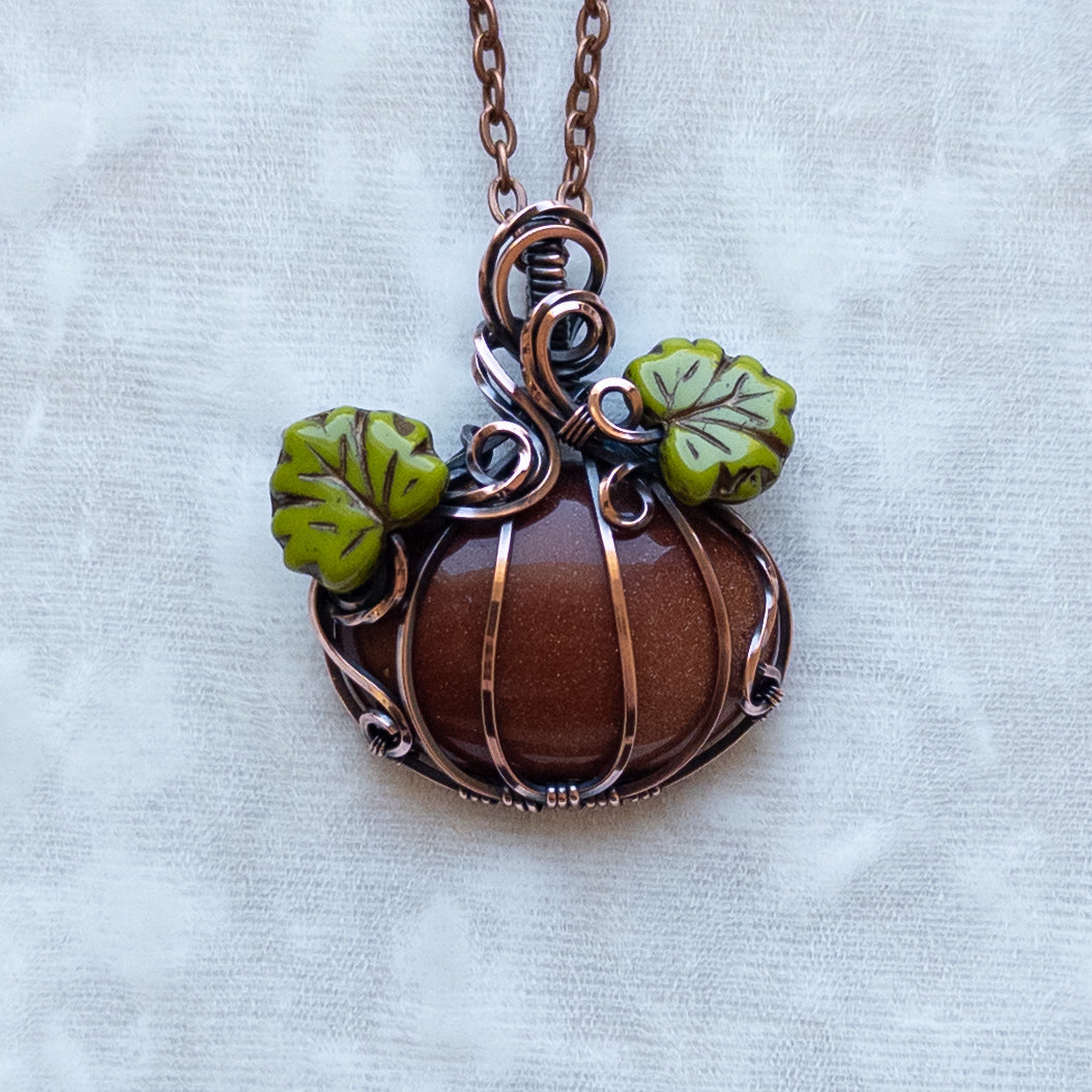 Orange Goldstone Antiqued Copper Pumpkin Pendant With Czech Glass Leaves