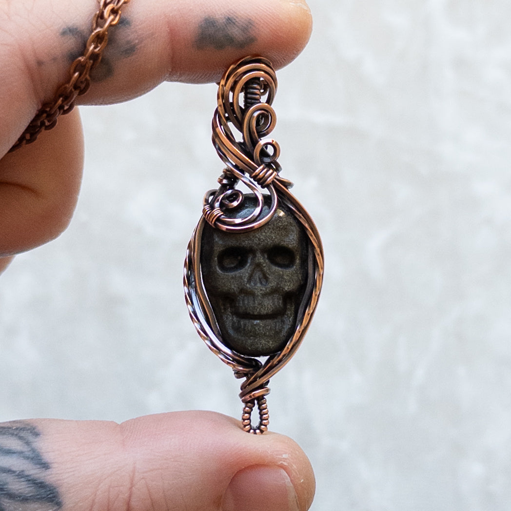 Silver/Gold Sheen Obsidian Skull Antiqued Copper Pendant