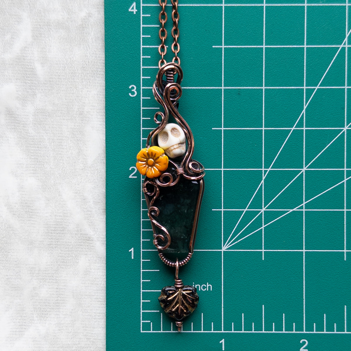 Moss Agate Coffin, Skull, & Marigold Antiqued Copper Pendant With Dangling Czech Glass Leaf