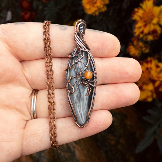 Botswana Agate Spider Web Antiqued Copper Pendant With Orange Aventurine Spider