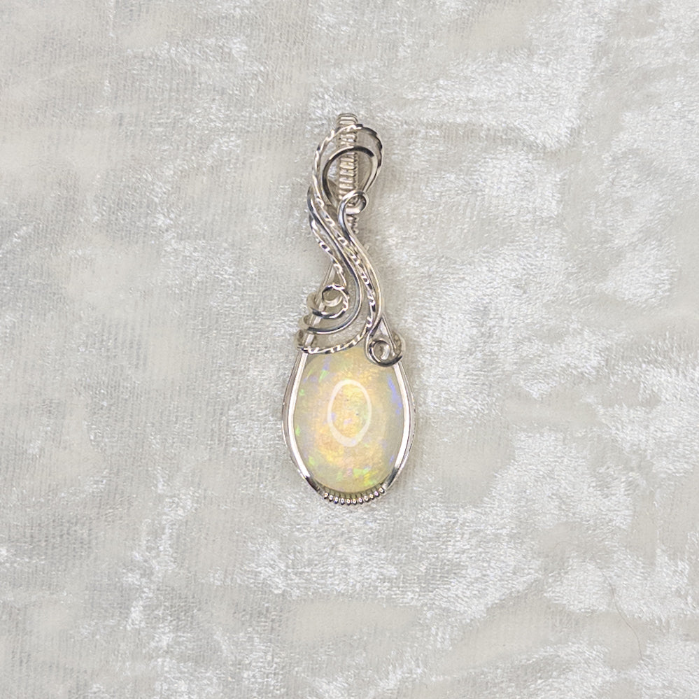 7.8ct. Welo Opal & .925 Sterling Silver Pendant
