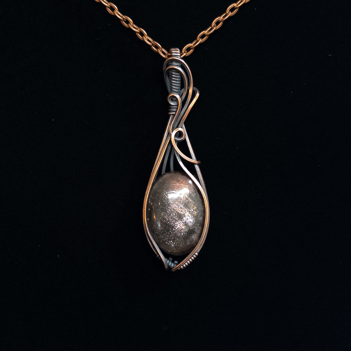 Purple Haze Sunstone Copper Wrapped Pendant