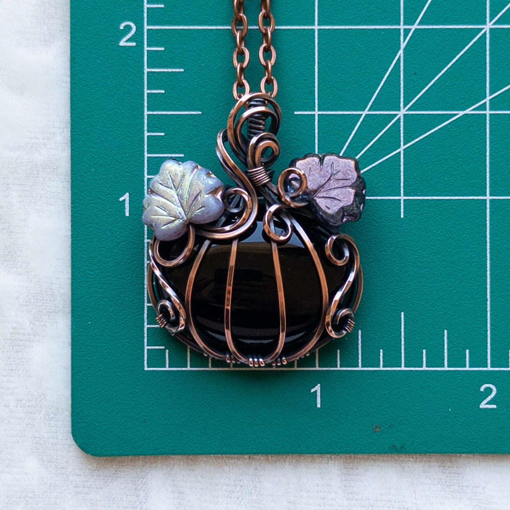 Black Onyx Antiqued Copper Pumpkin Pendant With Purple Leaves