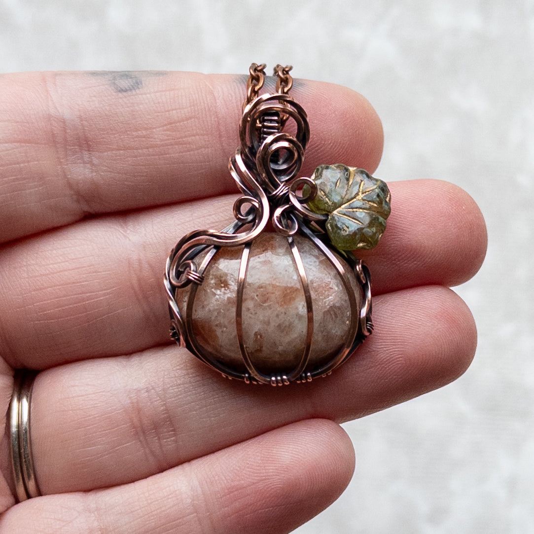 Sunstone Antiqued Copper Pumpkin Pendant With Czech Glass Leaf