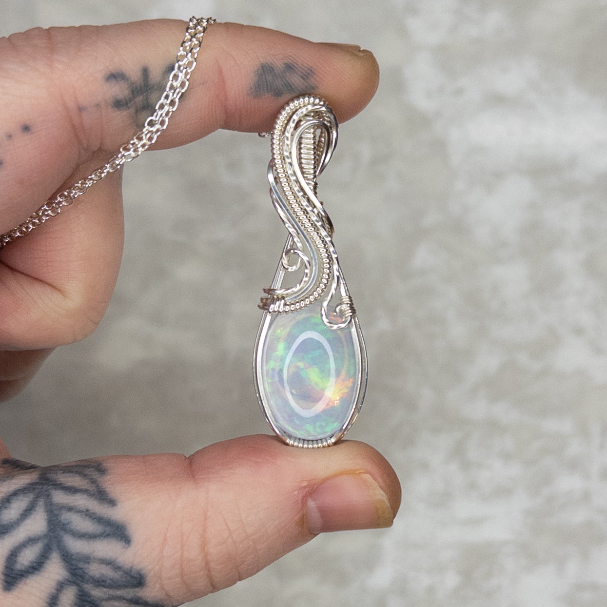 11.75ct. Ethiopian Opal .925 Sterling Silver Pendant