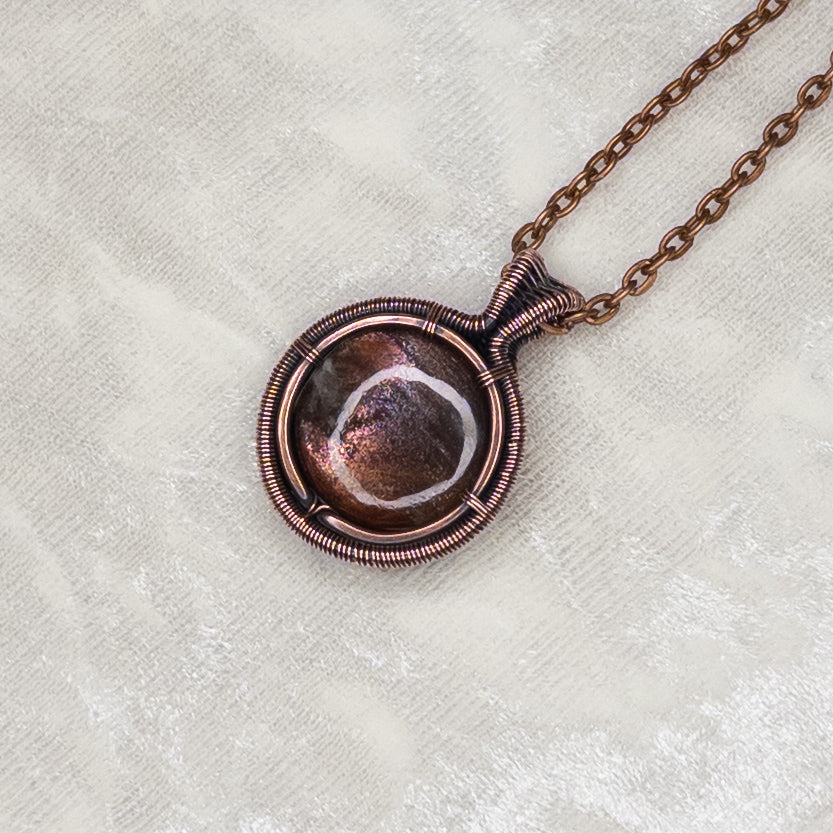 Purple Haze Sunstone Antiqued Copper Medallion Pendant
