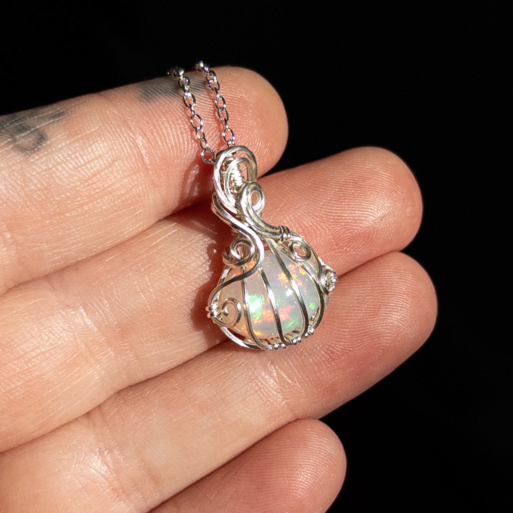 3.6 Carat Ethiopian Opal Sterling Silver Pumpkin Pendant