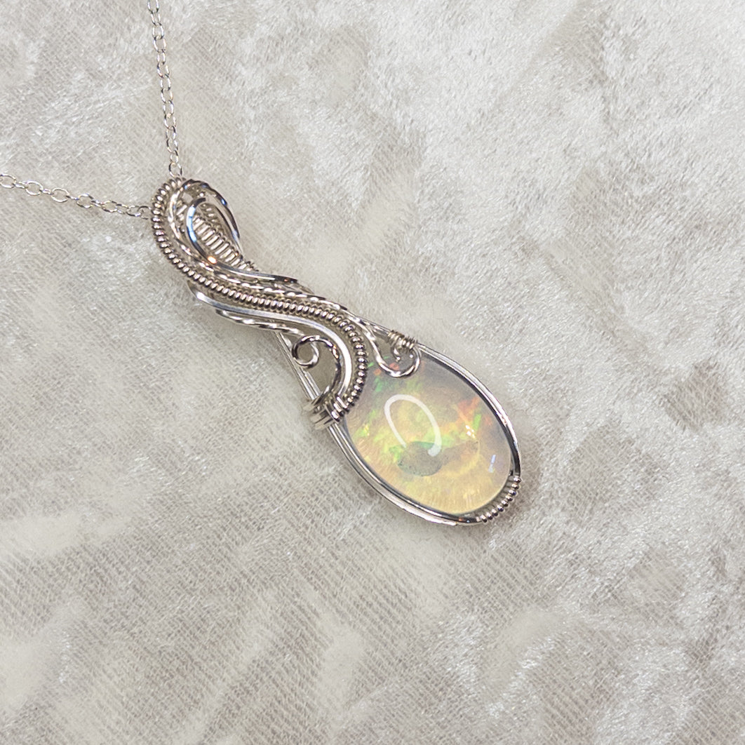 11.75ct. Ethiopian Opal .925 Sterling Silver Pendant