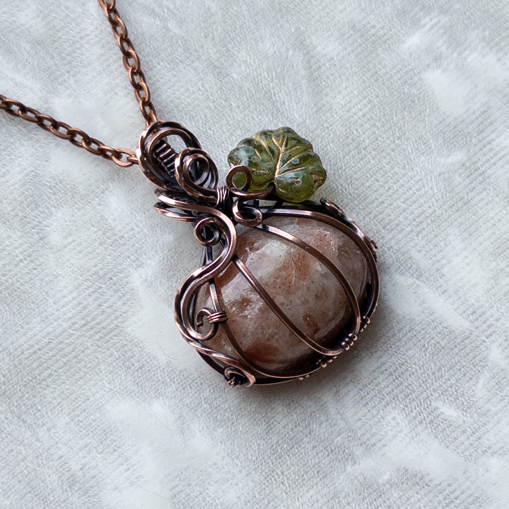 Sunstone Antiqued Copper Pumpkin Pendant With Czech Glass Leaf