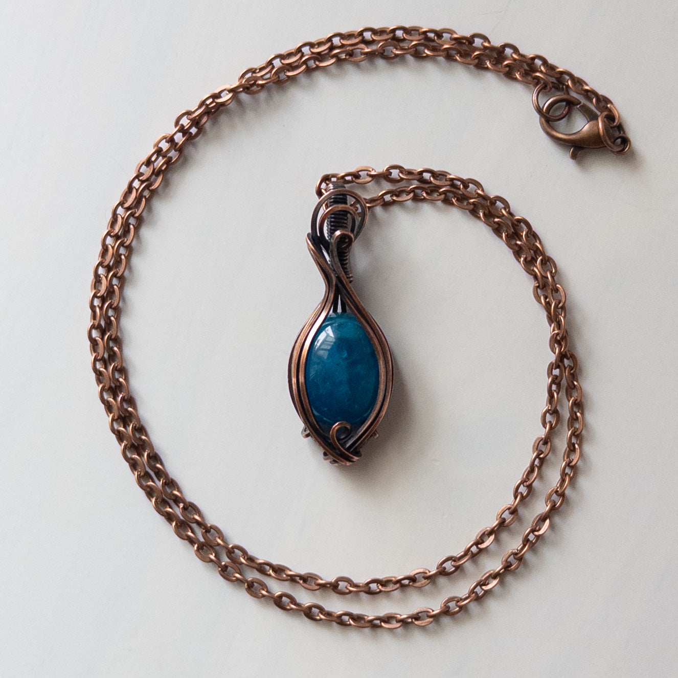 Dainty Blue Apatite Copper Wrapped Pendant