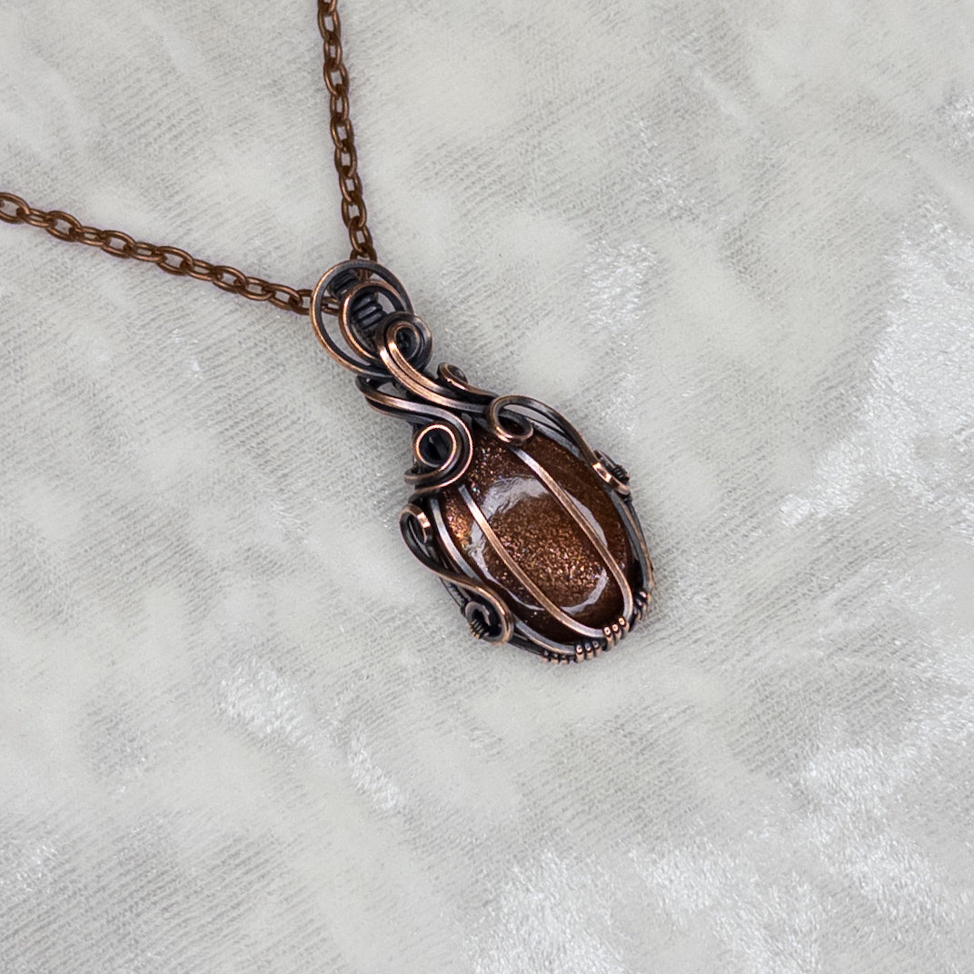 Dark Sunstone Antiqued Copper Pumpkin Pendant