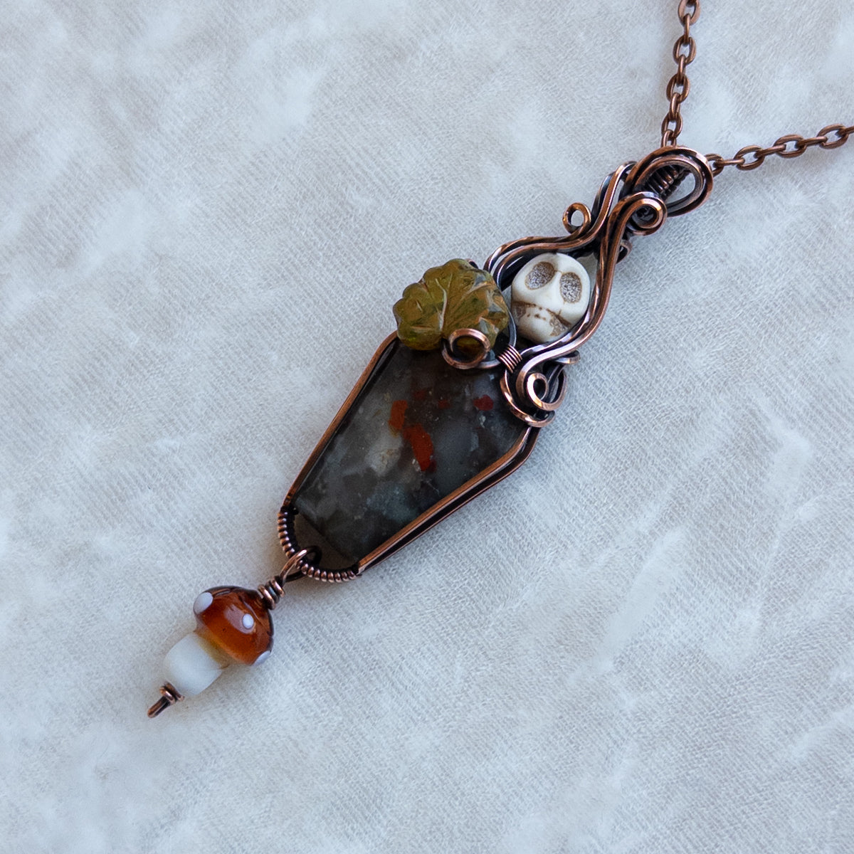 African Bloodstone Coffin Antiqued Copper Pendant With Skull, Leaf, & Dangling Glass Mushroom