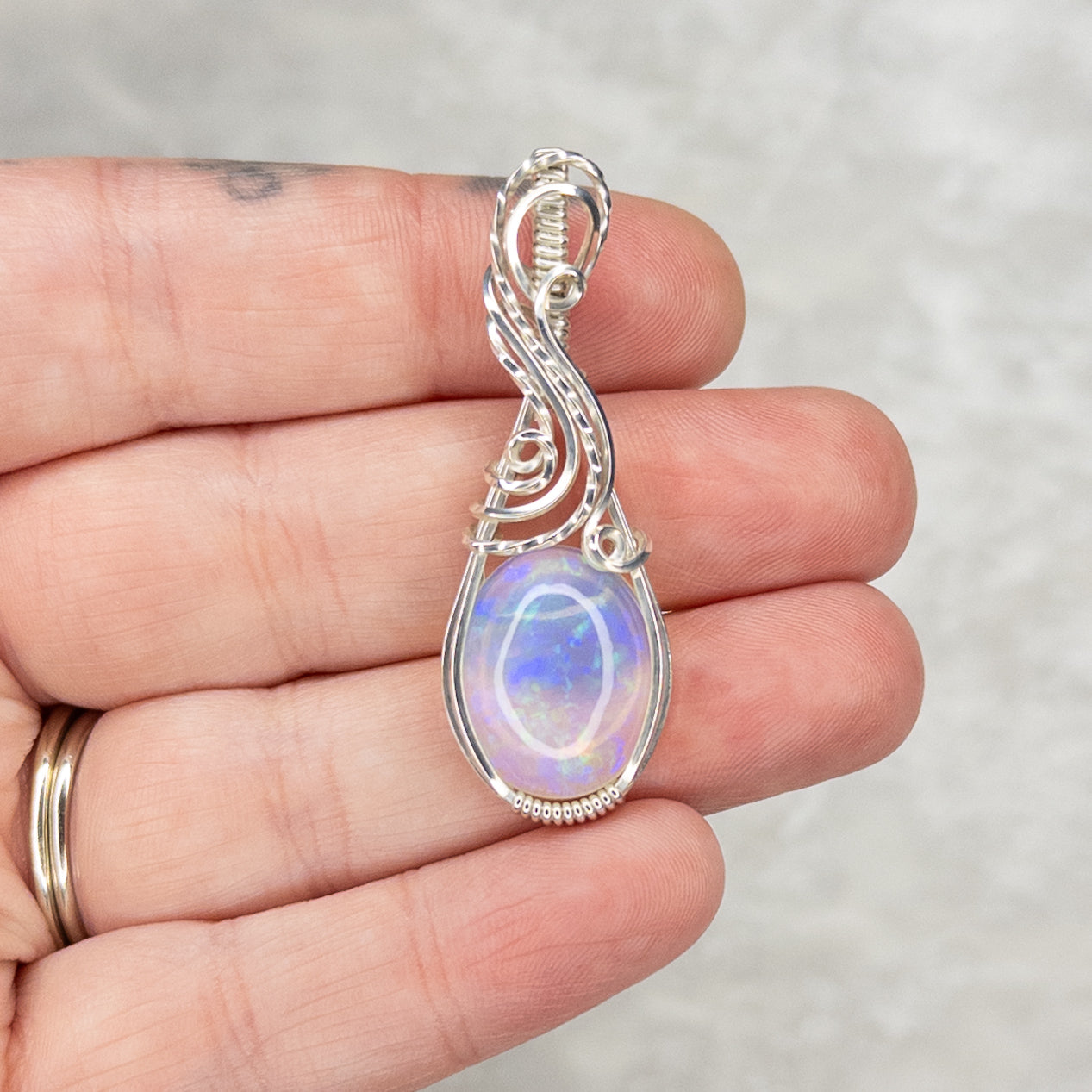7.8ct. Welo Opal & .925 Sterling Silver Pendant