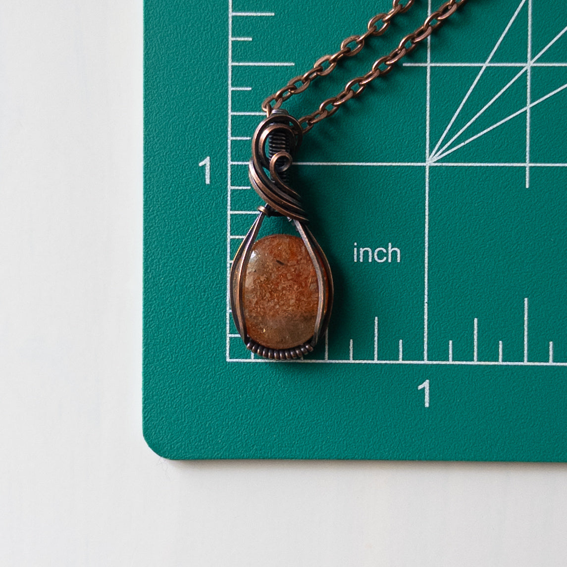 Dainty Sunstone Copper Wrapped Pendant