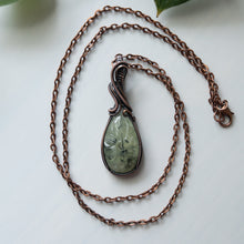 Load image into Gallery viewer, Prehnite With Carved Flower Motif &amp; Copper Wrapped Pendant
