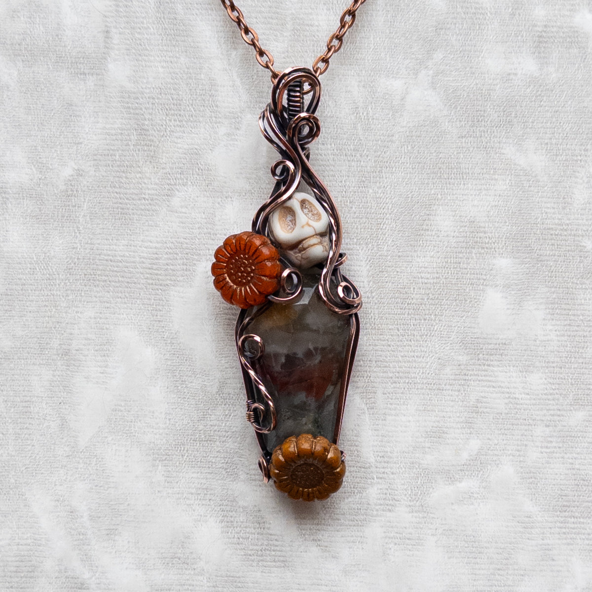 African Bloodstone Coffin, Skull, & Sunflower Antiqued Copper Pendant