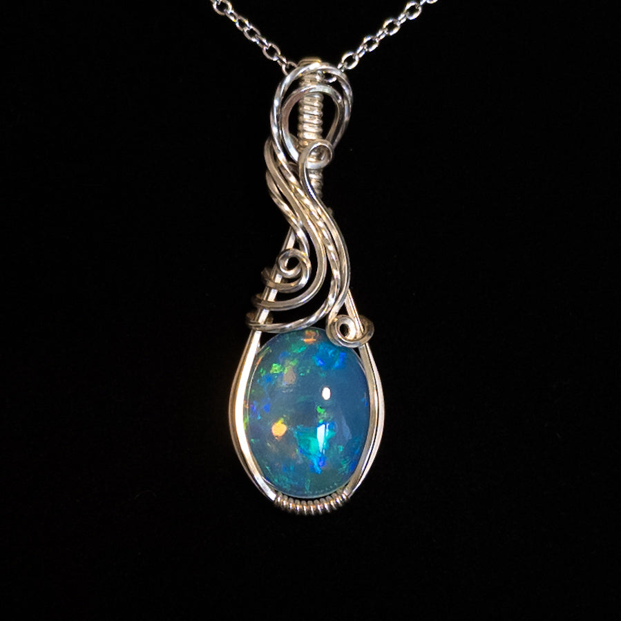7.8ct. Welo Opal & .925 Sterling Silver Pendant