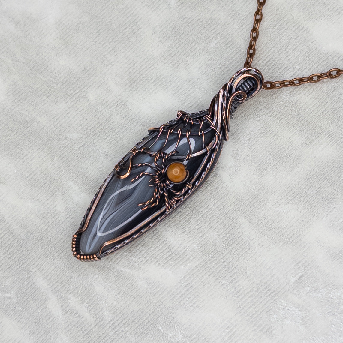 Botswana Agate Spider Web Antiqued Copper Pendant With Orange Aventurine Spider