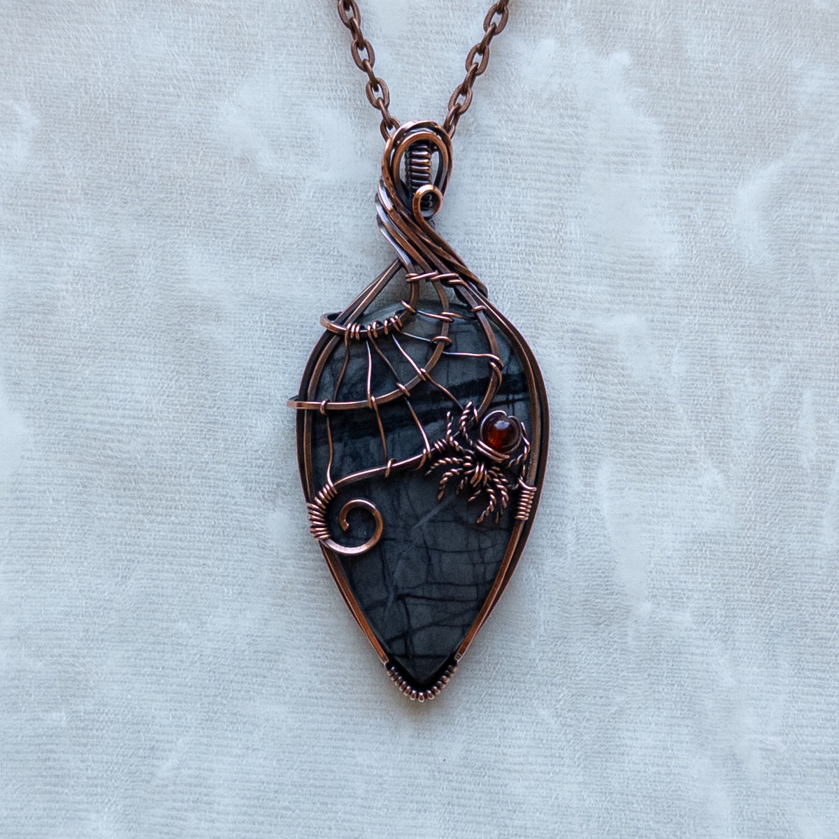 Picasso Jasper With Garnet Spider & Web Antiqued Copper Pendant