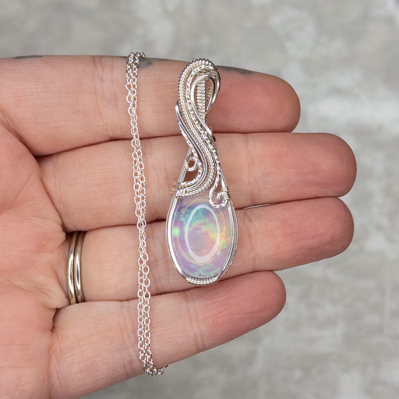11.75ct. Ethiopian Opal .925 Sterling Silver Pendant