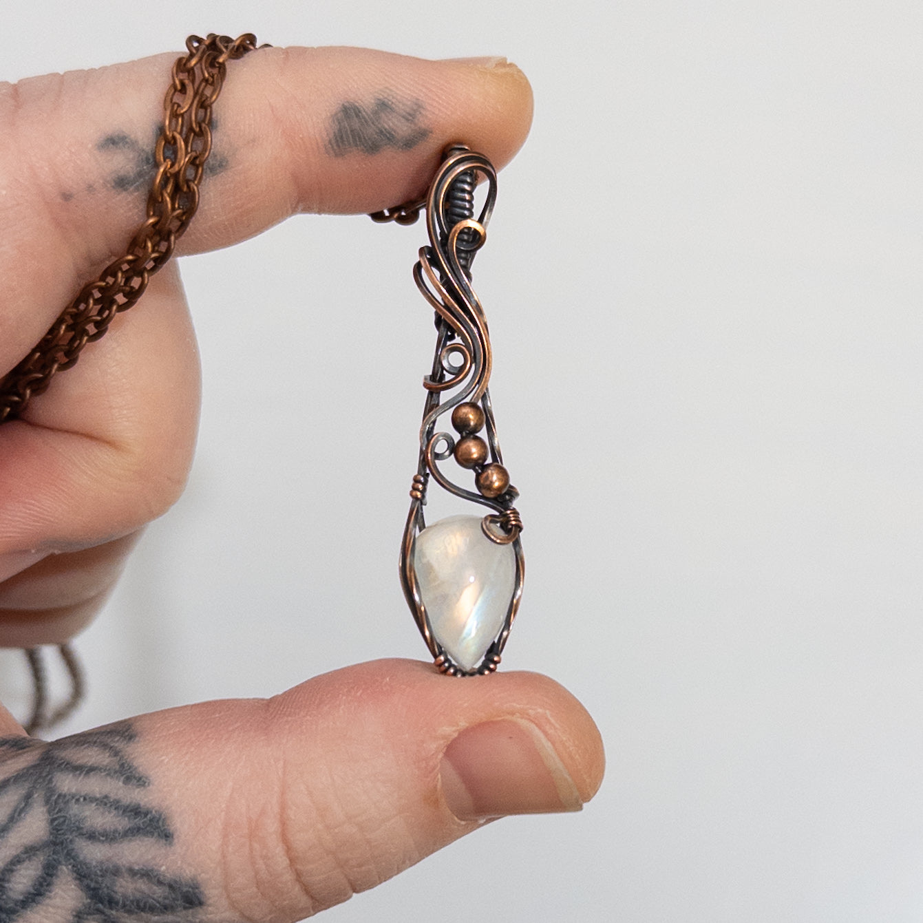 Dainty Rainbow Moonstone Copper Wrapped Pendants