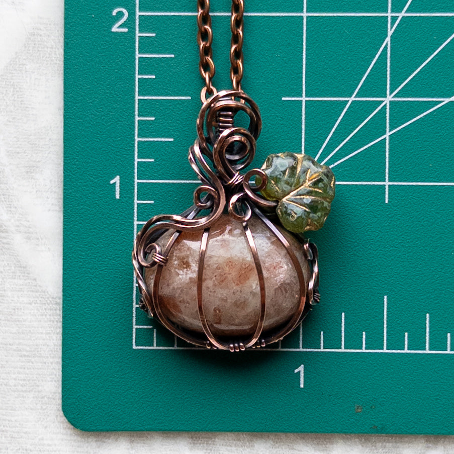 Sunstone Antiqued Copper Pumpkin Pendant With Czech Glass Leaf