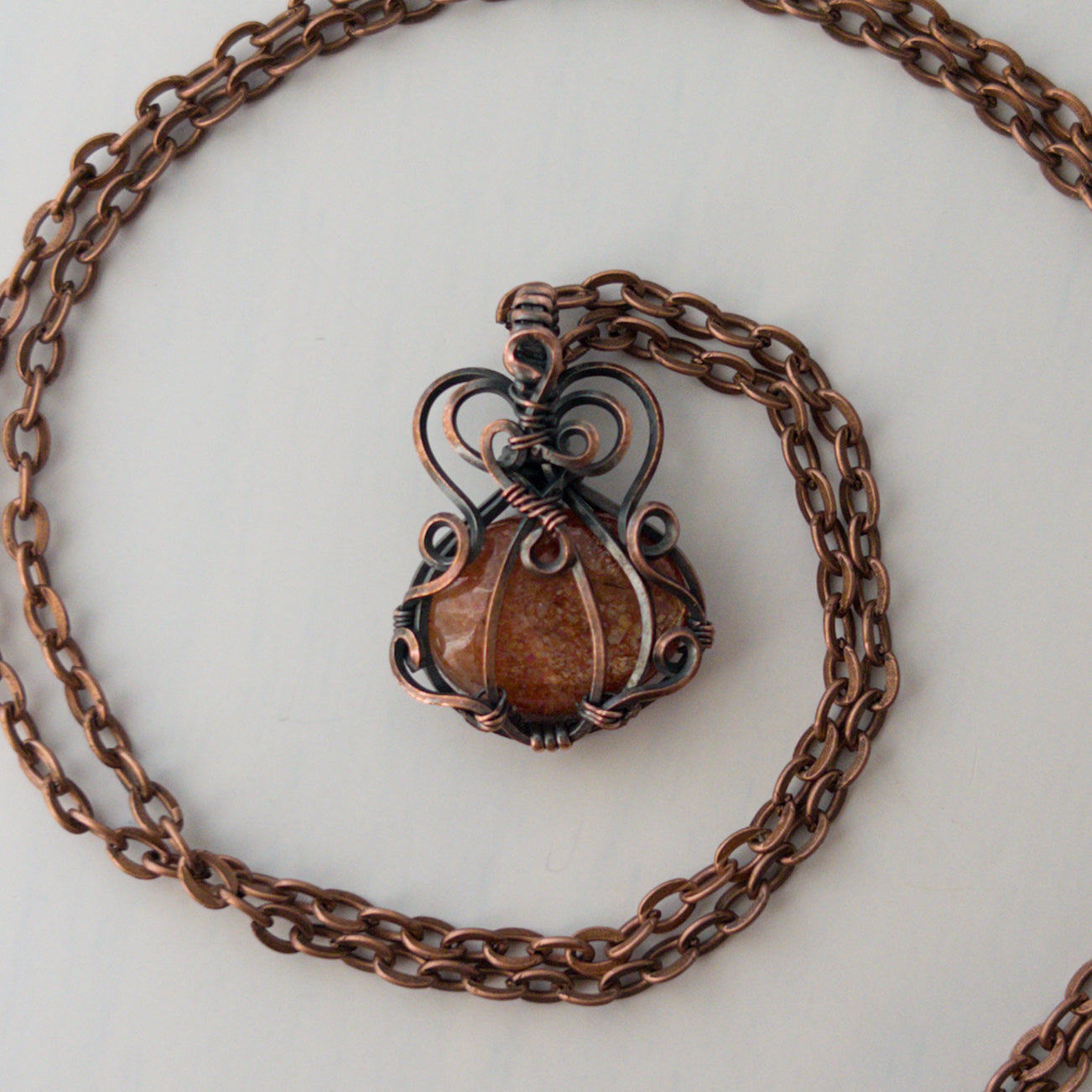 Dainty Sunstone Pumpkin Antiqued Copper Wrapped Pendant