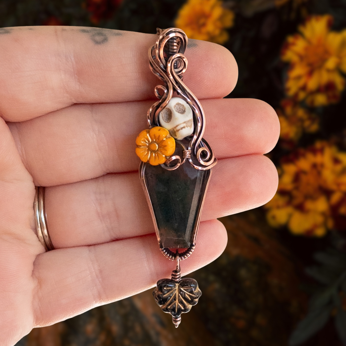 Moss Agate Coffin, Skull, & Marigold Antiqued Copper Pendant With Dangling Leaf