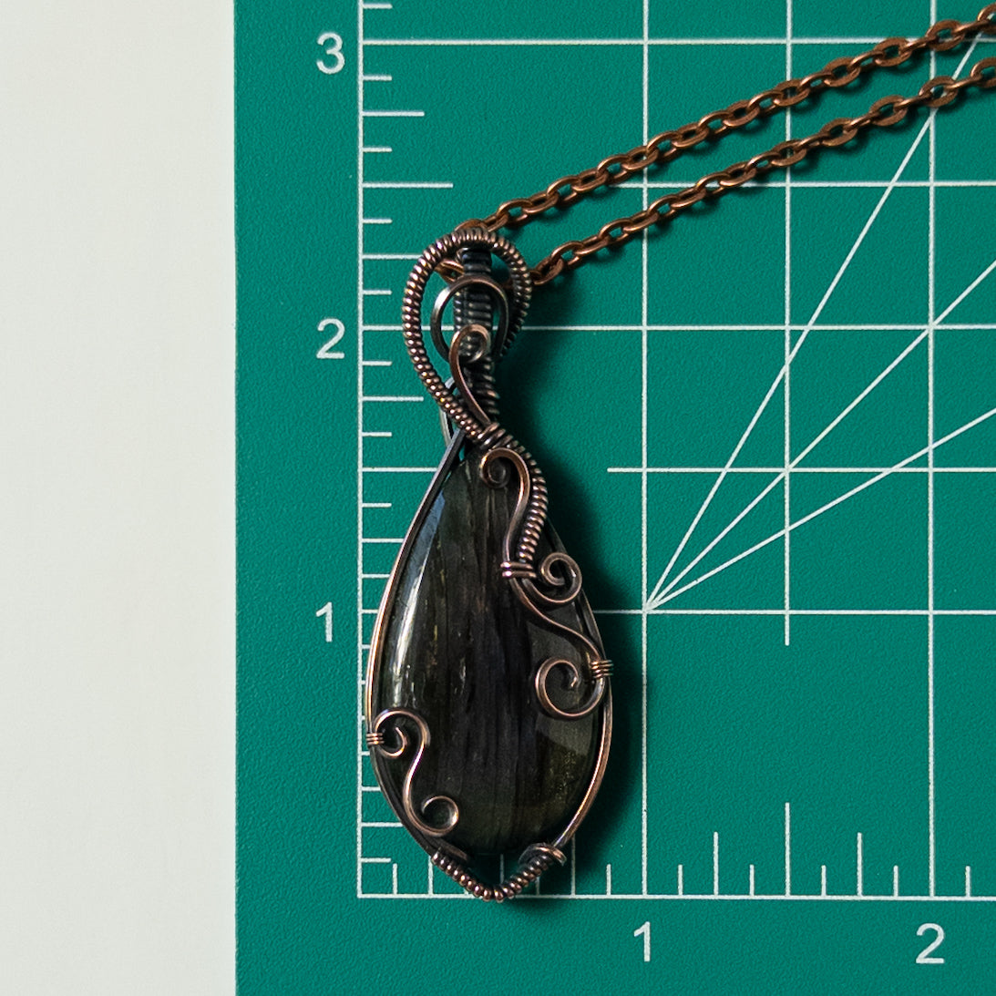 Purple Labradorite with Swirl Design Antiqued Copper Wrapped Pendant