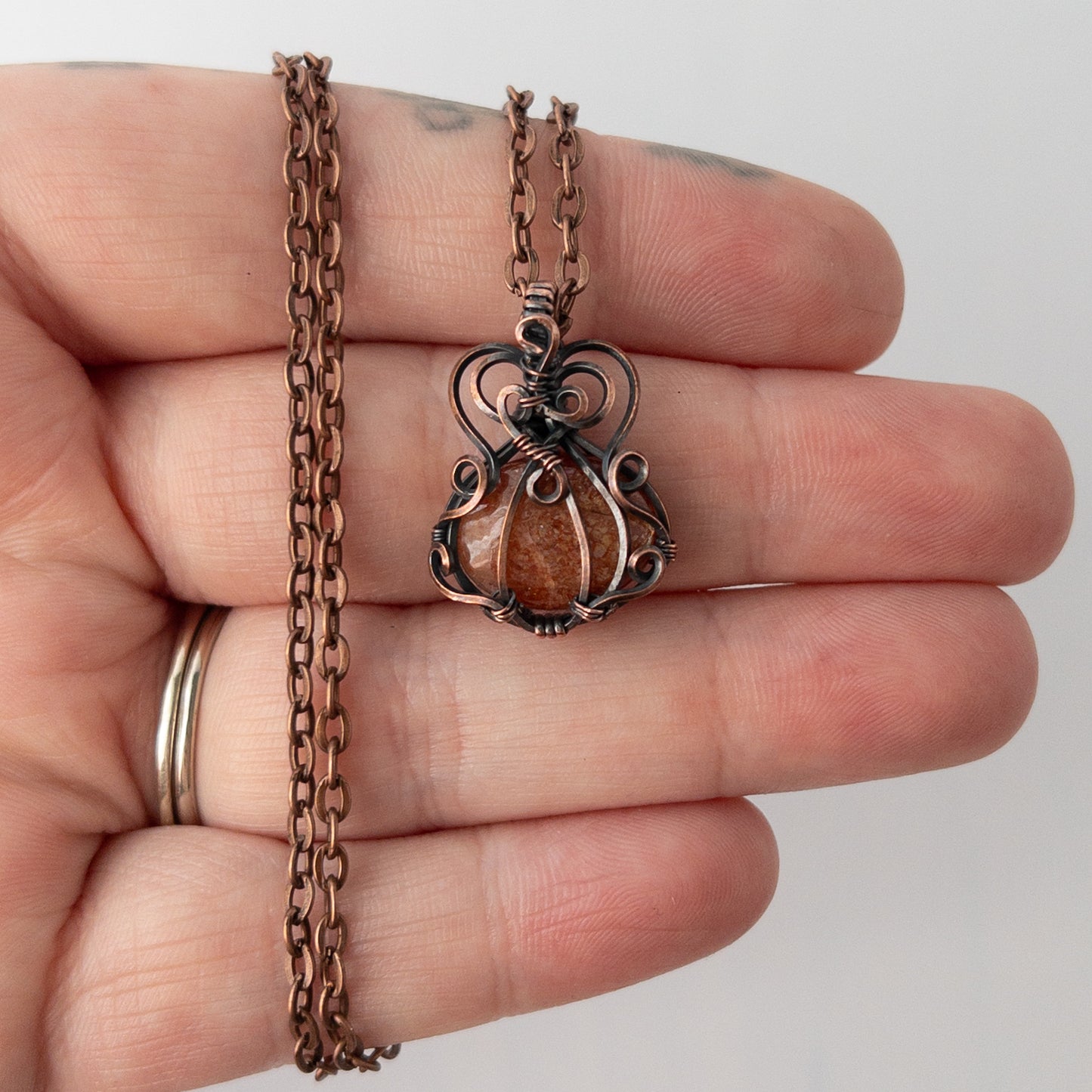 Dainty Sunstone Pumpkin Antiqued Copper Wrapped Pendant