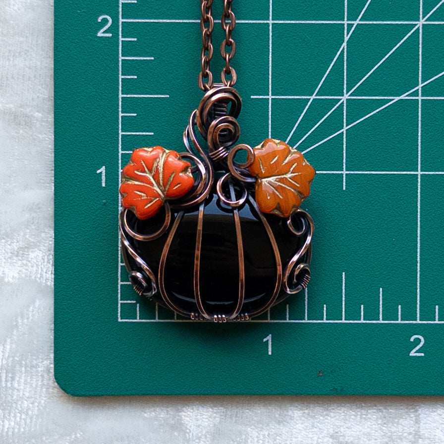 Black Onyx Pumpkin Pendant With Orange Czech Glass Leaves - Antiqued Copper