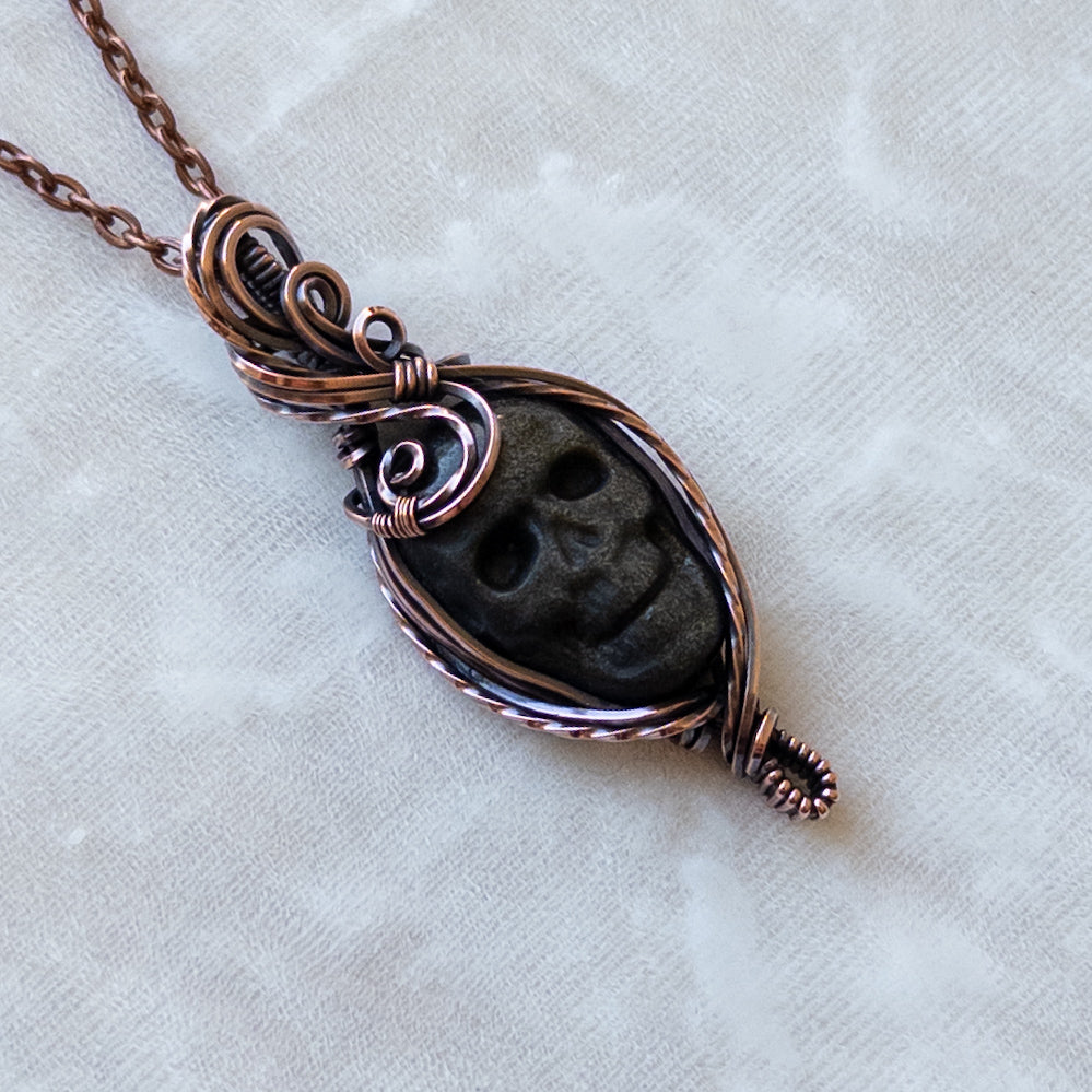 Silver/Gold Sheen Obsidian Skull Antiqued Copper Pendant
