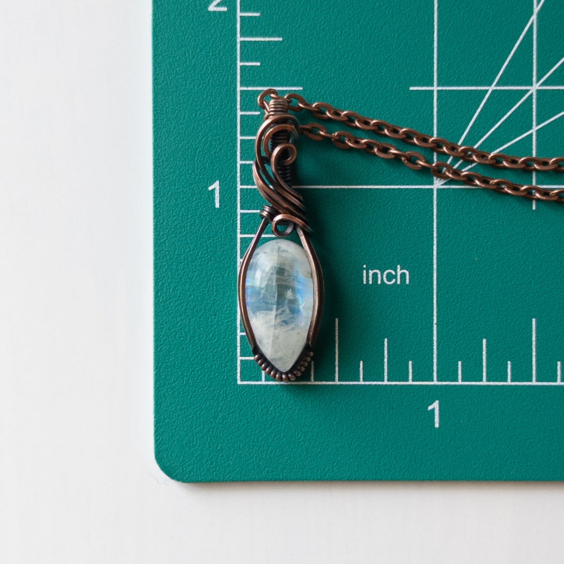 Dainty Moonstone Copper Wrapped Pendant