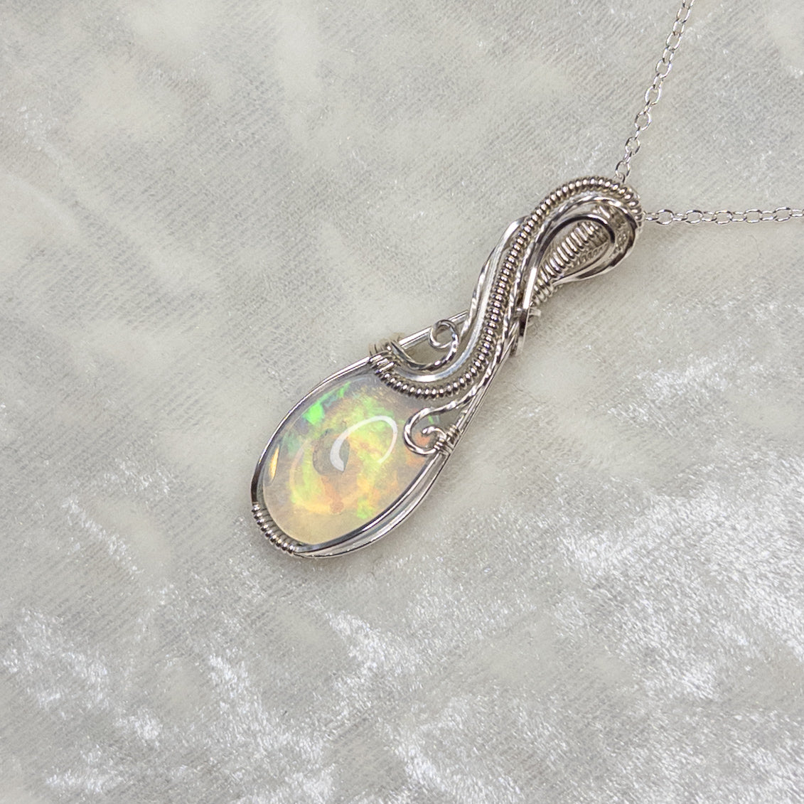 11.75ct. Ethiopian Opal .925 Sterling Silver Pendant
