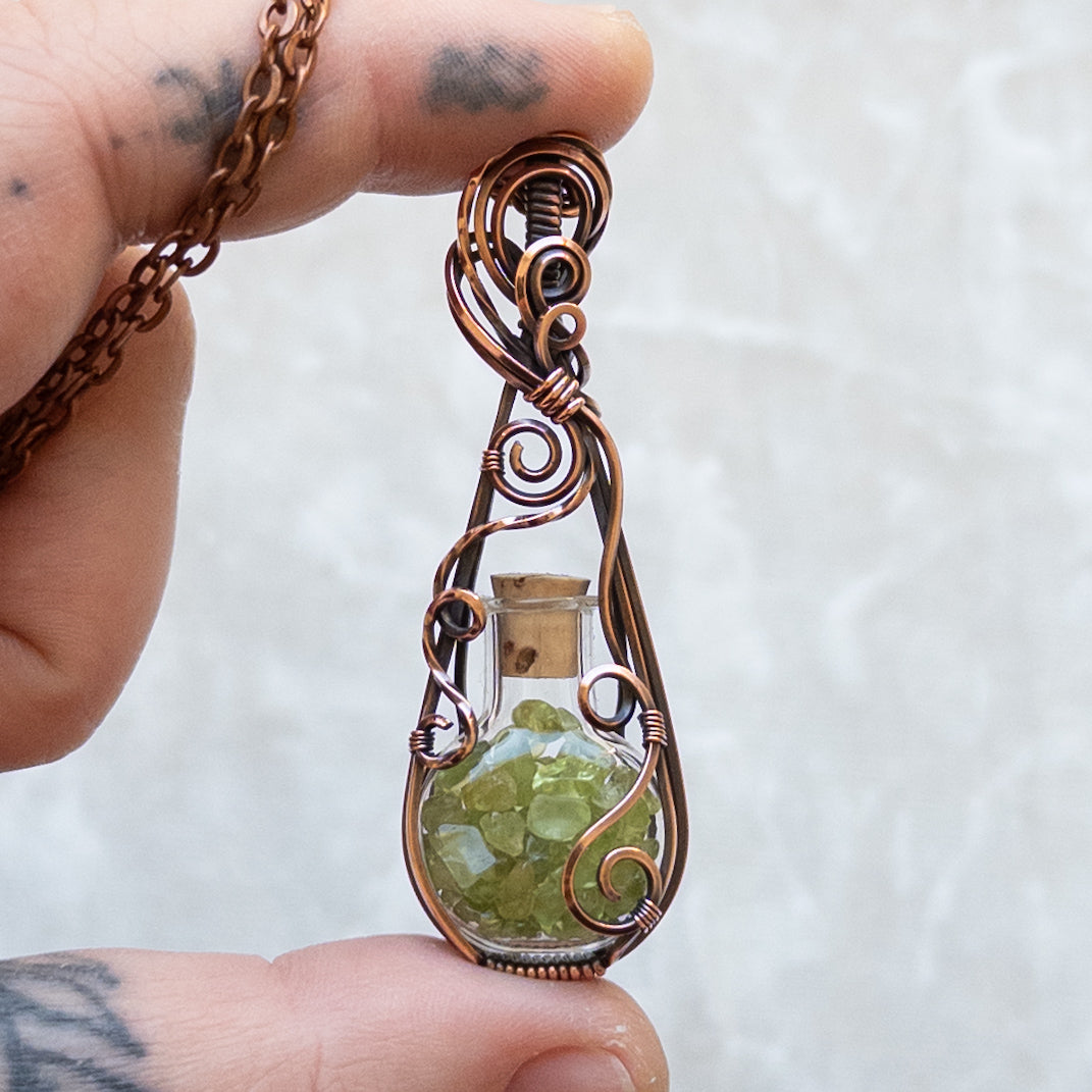 Peridot Filled Glass Bottle Antiqued Copper Pendant