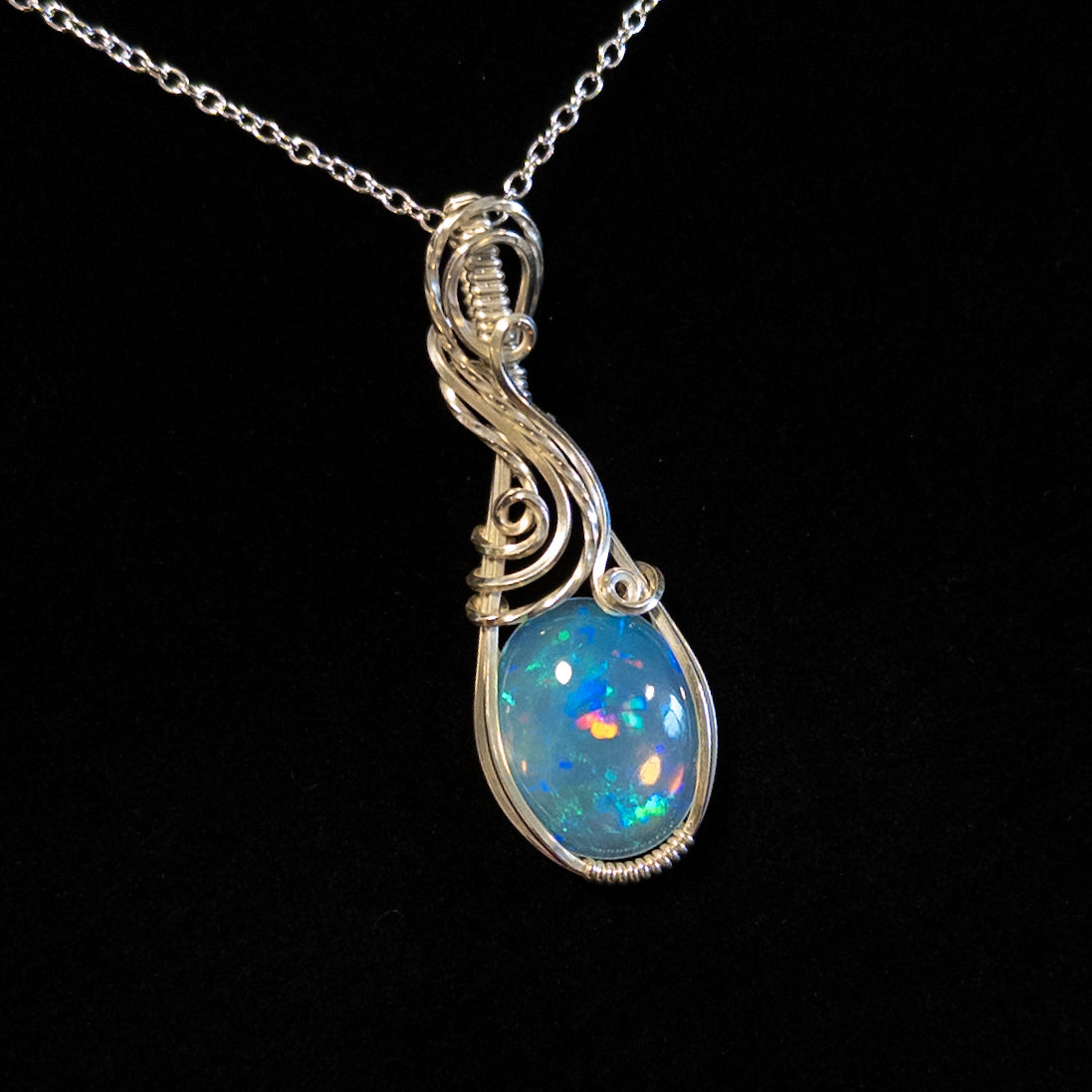 7.8ct. Welo Opal & .925 Sterling Silver Pendant